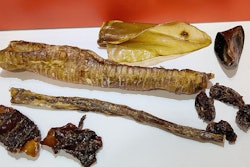 Water buffalo co-product dog chews, including trachea, lung, hoof and ear, at Honey I'm Home's booth at SuperZoo 2021 | Tim Wall