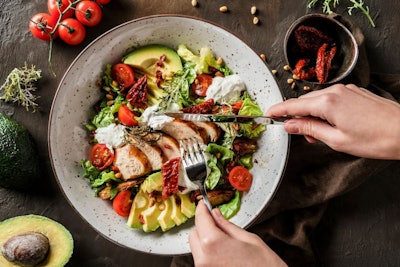 The gradual return to normality in the European economy, and particularly the return of the hotel, catering and restaurant sectors, has been boosting demand for chicken and hence compound feed. This should continue as 2022 progresses. (Jukov studio | Shutterstock.com)