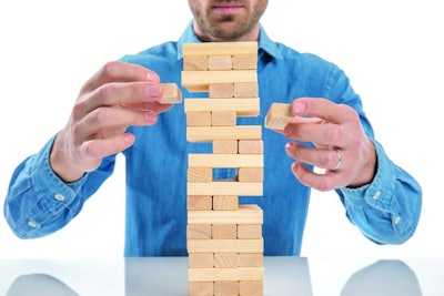 man-playing-jenga