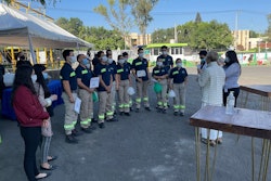 Staff at ADM's Pet Solutions pet food plant in Guadalajara, Mexico, prepare for a ceremony to announce a production expansion.