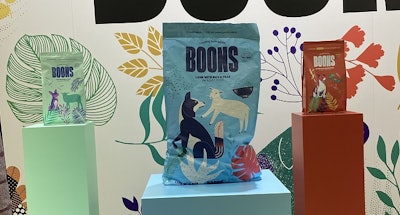 Pet food and treat packages featuring fun, whimsical illustrations were plentiful at Interzoo 2022.