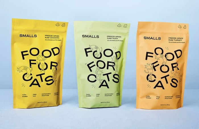 three colorful bags of smalls cat food for cats
