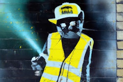 Dall·e 2024 02 26 10 40 13 Spray Paint Graffiti Painting By Banksy Of Cat Dressed As Construction Worker