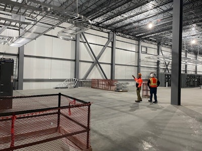 Conveyers were recently installed inside the more than 10-story structure, with more installation, repair and testing equipment on the horizon.