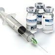 Syringe With Vaccine In Vials