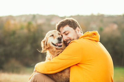 Human Hugging Pet