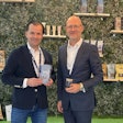 Alexander Gerards, managing partner at Dr. Clauder’s, and Herman Sloot, vice president of commercial development for Calysta, highlight the new Trainee dog snacks with fermented protein ingredients at Interzoo 2024.