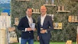 Alexander Gerards, managing partner at Dr. Clauder’s, and Herman Sloot, vice president of commercial development for Calysta, highlight the new Trainee dog snacks with fermented protein ingredients at Interzoo 2024.