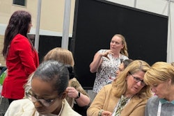 Tamara Ghandour answers an attendee's question during the Women in Petfood Leadership networking lunch on May 1.
