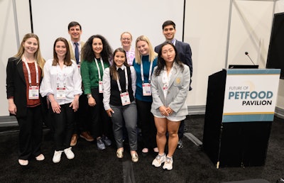 Petfood Forum 2024 Student Program participants stand with Program Coordinator and Petfood Industry Editor Lindsay Beaton. Back (L to R): Gerardo Abascal-Ponciano (Auburn University), Lindsay Beaton, Jorge Sandoval (Auburn University). Front (L to R): Larissa Koulicoff (Kansas State University), Vanessa De La Guardia-Hidrogo (University of Illinois Urbana-Champaign), Elaheh Rabiee (Kansas State University), Hilary Carrera (Auburn University), Katelyn Bailey (Kansas State University), Youhan Chen (Kansas State University)