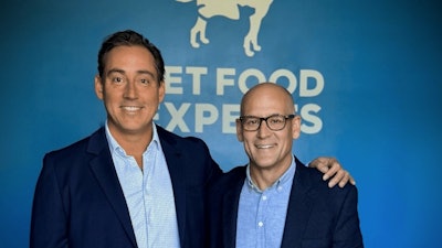 Michael Baker, vice chair, Pet Food Experts board of directors, and Greg Cyr, president and CEO.