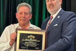 David Kaluzny II (left) is presented the 2024 Don Franco Award by NARA chairman Michael Glenn (right).
