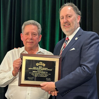 David Kaluzny II (left) is presented the 2024 Don Franco Award by NARA chairman Michael Glenn (right).