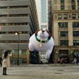 To bring awareness to the issue of overweight dogs, IAMS purposefully wedged an oversized dog balloon between buildings before Chicago's Thanksgiving Day parade.