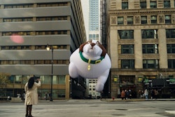 To bring awareness to the issue of overweight dogs, IAMS purposefully wedged an oversized dog balloon between buildings before Chicago's Thanksgiving Day parade.