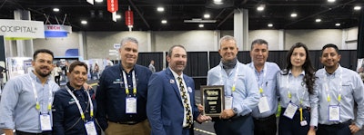 2025 IPPE New Product Showcase Best of the Best in Live Production presented to Sephnos. Nath Morris (left), president, USPOULTRY, and Dr. Francisco Javier Septién, director, research and innovation of products and international markets for Sephnos, along with other Sephnos employees.