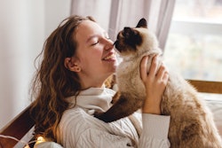 Happy Cat With Owner