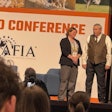 Jessica Starkey, Ph.D., and Charles Starkey, Ph.D. (right) presented AFIA's 2025 Friend of Pet Food Award to Eric Altom, Ph.D. (center).