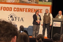 Jessica Starkey, Ph.D., and Charles Starkey, Ph.D. (right) presented AFIA's 2025 Friend of Pet Food Award to Eric Altom, Ph.D. (center).