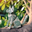 Dall·e 2024 05 23 16 01 20 An Origami Cat Made From Dollar Bills, Sitting In A Tree The Tree Should Have Detailed Branches And Leaves, And The Origami Cat Should Be Clearly Vis
