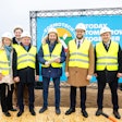The official groundbreaking ceremony in Kėdainiai included the placement of a symbolic time capsule containing a letter from Rostyslav Vovk, chairman of the board and co-owner of the Kormotech Group of Companies.
