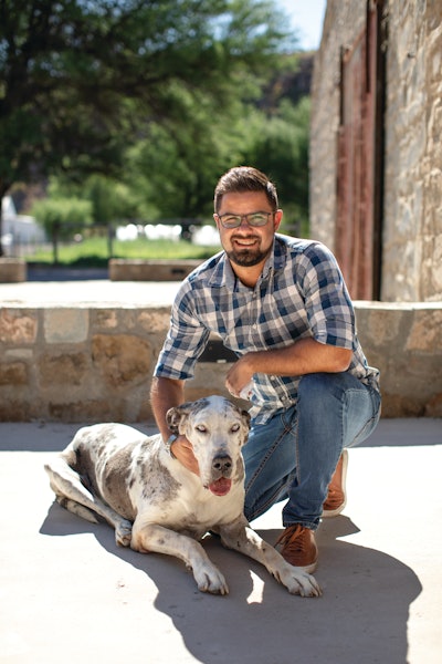 A family-owned business, South Africa-based Montego Pet Nutrition has served up excellence to the African pet markets and beyond for 25 years. Pictured: Managing Director Johan van Jaarsveld with his (now passed) Great Dane Saartjie.