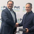 Michael Landa, Nulo Pet Food, received the Power of Pets Award from Mike Bober, president and CEO of PAN.