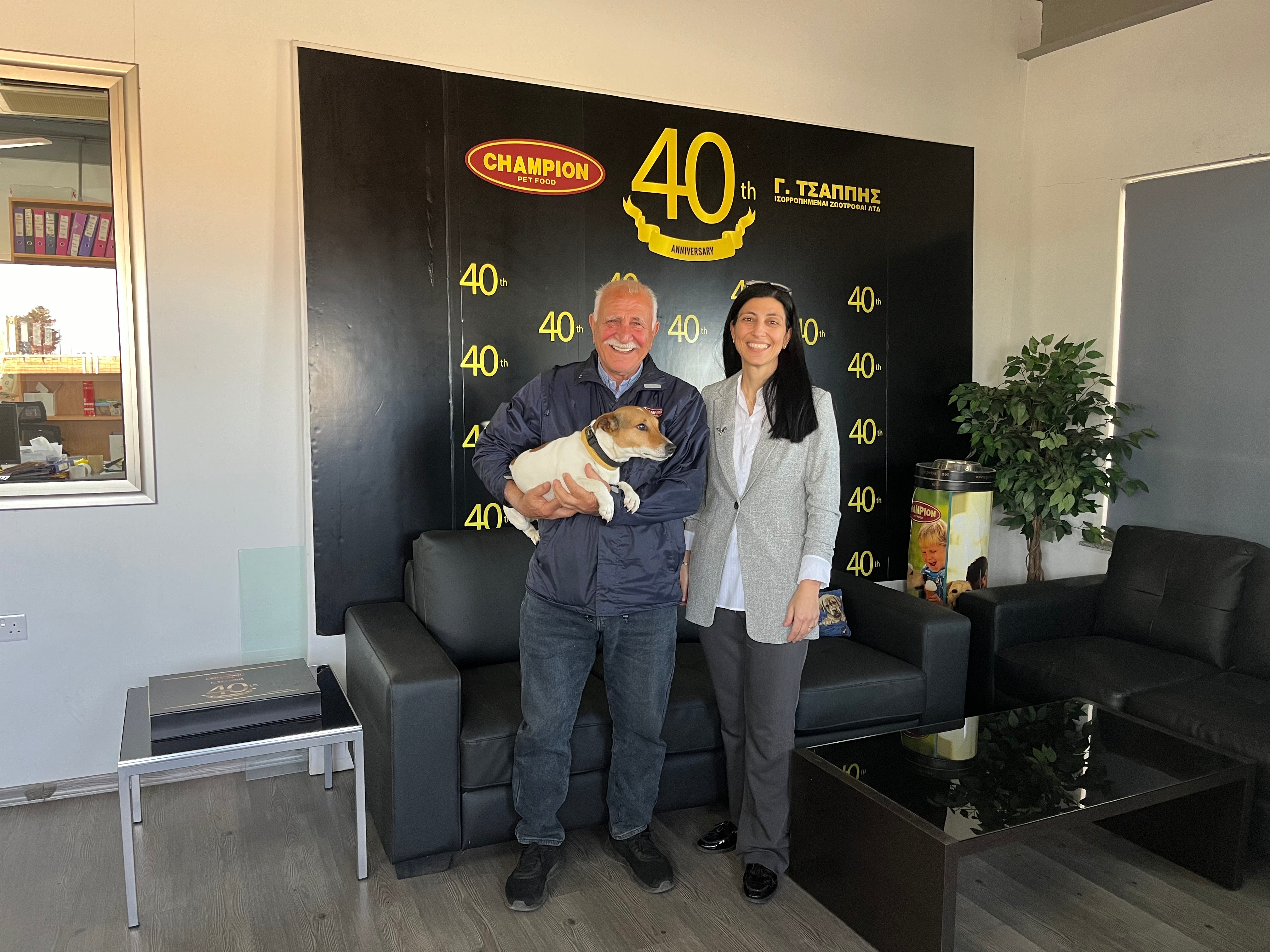 Georgios Tsappis, founder and managing director, and his daughter Sophia, business manager, together with Messi the Jack Russell terrier, keep an eye toward the future for Champion Pet Food based in Cyprus.