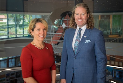 Dr. Mark Lyons (right), president and CEO of Alltech, is shown with Tara McCarthy (left), global vice president of ESG at Alltech.