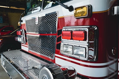 The fire at the Purina Mills pet food plant originated in an 80-foot-tall grain bin containing 50 tons of material and is believed to have been spontaneous.