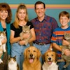 Sitcom Family In The 1990s With Two Dogs And Three Cats