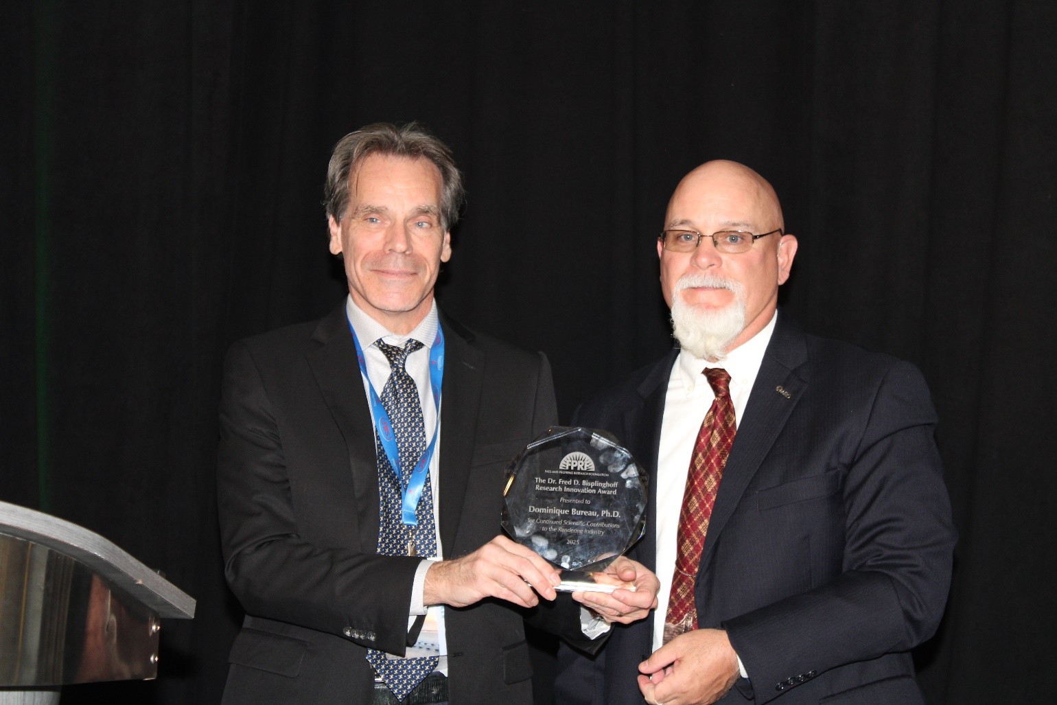 Left: Dr. Dominique Bureau, Right: Dr. Charles Starkey, FPRF and NARA