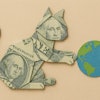 An Origami Dollar Bill In The Shape Of A Cat Playing With The Earth In Its Paws Like A Ball Of String