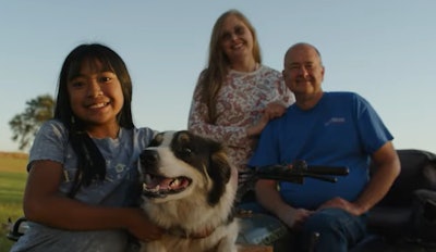 2026 Farm Dog of the Year, Max, herds beef cattle on the Enns' farm. His assistance supports John, who uses a mobility scooter.