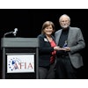 Jerry May was presented with the AFIA Friend of Pet Food Award by AFIA president and CEO Constance Cullman.
