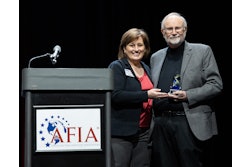 Jerry May was presented with the AFIA Friend of Pet Food Award by AFIA president and CEO Constance Cullman.