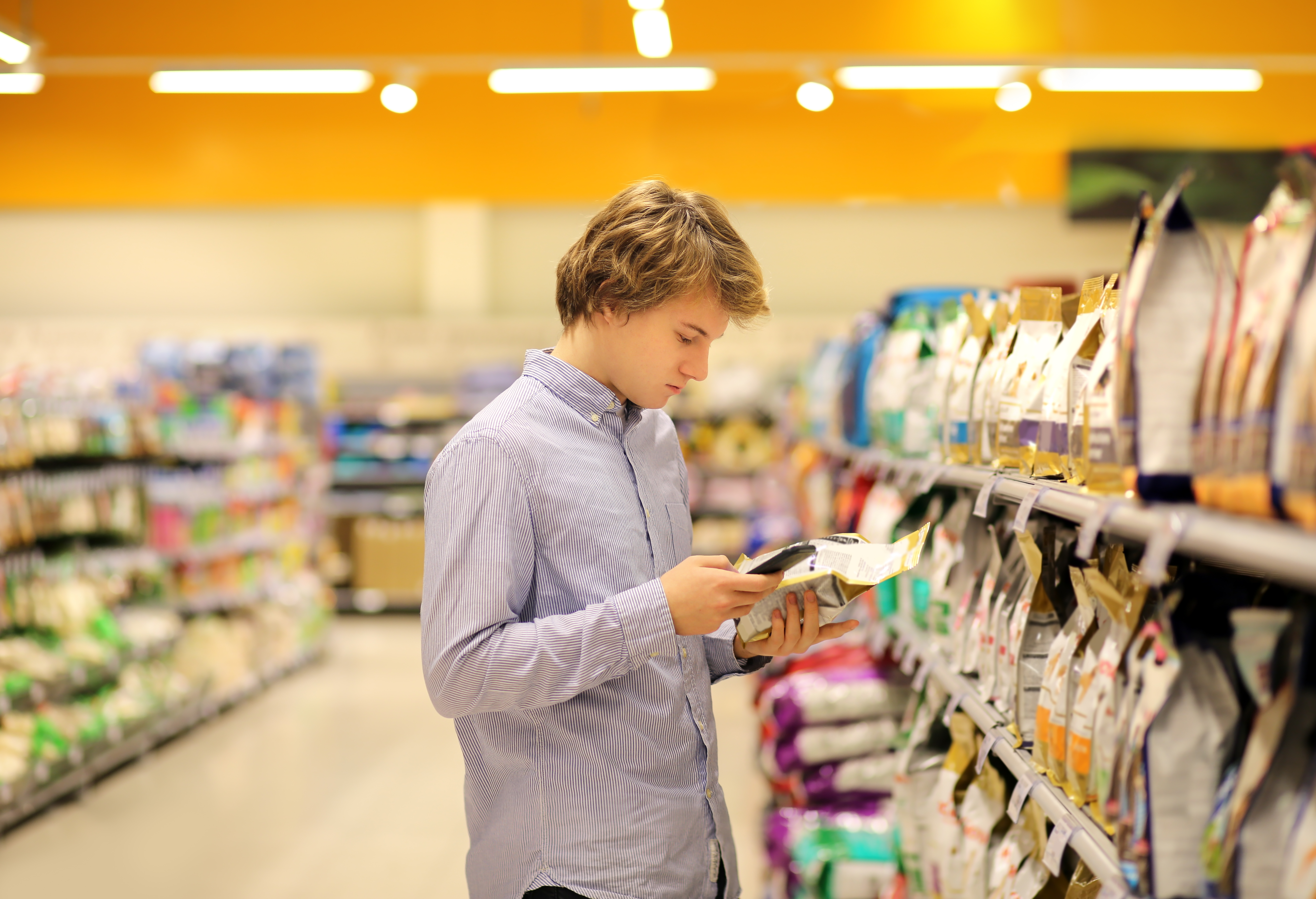 Young Man Shopping Petfood Store