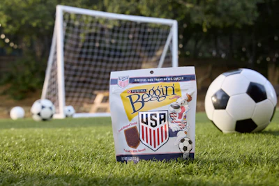 Beggin' is introducing U.S. Soccer Crest Bacon Flavor Dog Treats, shaped after the U.S. Soccer crest logo and made with bacon as the first ingredient.