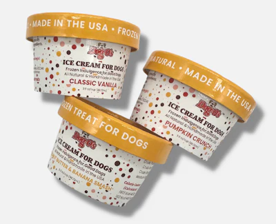 Three Ben & Jerry's Doggie Desserts ice cream pints with gold bands in Classic Vanilla, Pumpkin Crunch, and Peanut Butter Banana Smash flavors