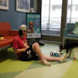 St. Louis Children's Hospital patient William Petla with his dog Bristol in Purina Family Pet Center.