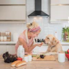 Dog Eating With Owner