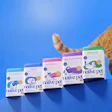 Native Pet cat supplement product line including Probiotic, Calm, Hairball, Multivitamin, and Immune formulas displayed with an orange cat