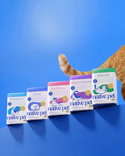 Native Pet cat supplement product line including Probiotic, Calm, Hairball, Multivitamin, and Immune formulas displayed with an orange cat