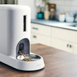 The Smart Feeder for Cats uses sensor technology and a built-in camera to identify up to five individual cats through facial recognition.