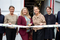 Six professionals at AlgiCEL ribbon-cutting ceremony in front of facility entrance