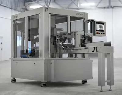 Industrial CNC precision manufacturing machine with gray enclosure and control panel in modern factory warehouse